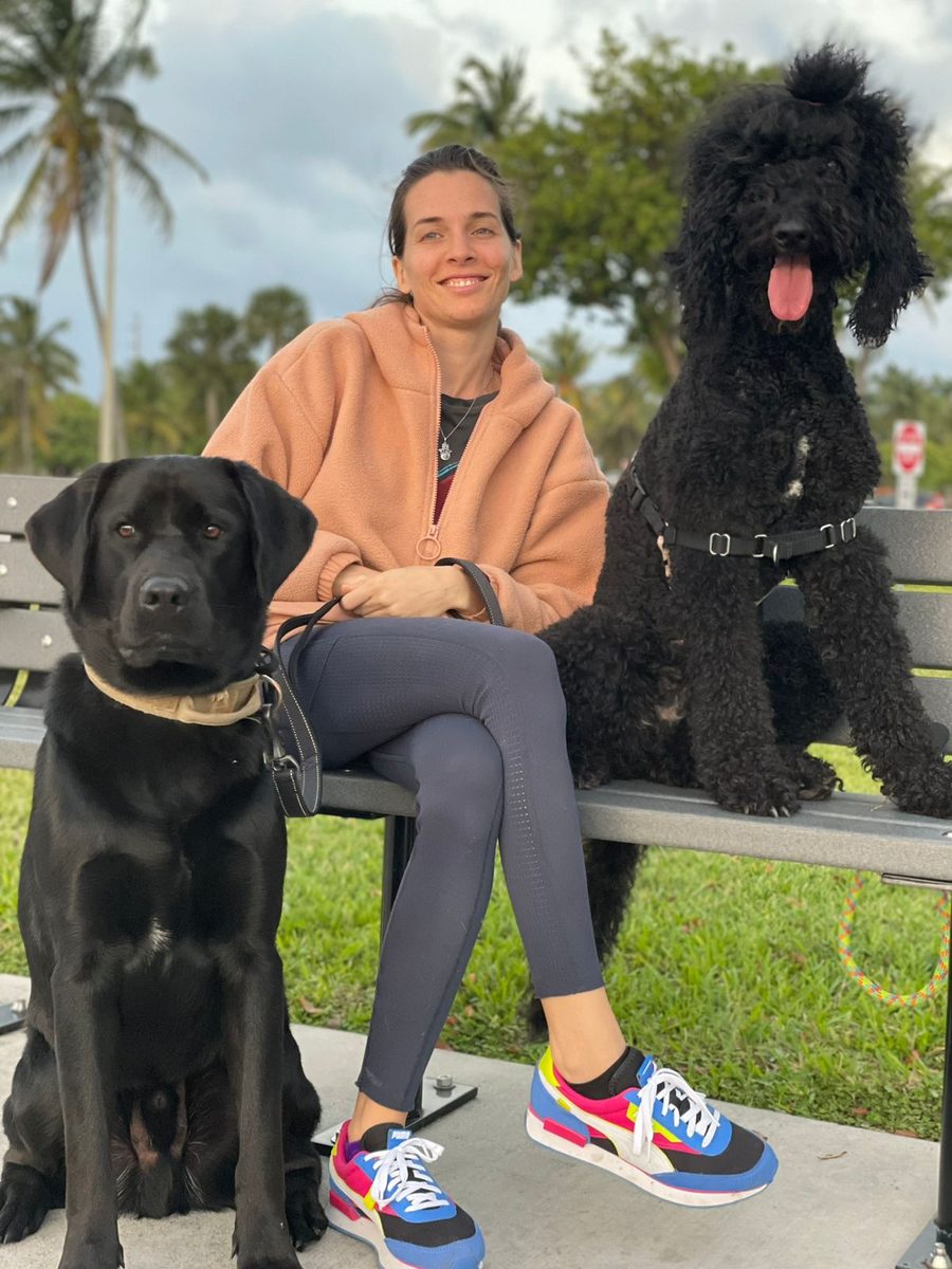 Kendra and her furry kids at The Caring Paws