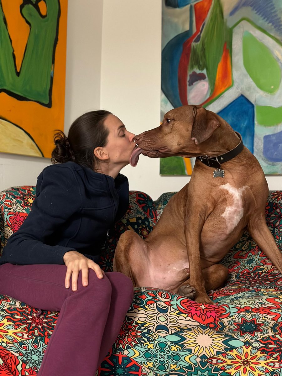 Kendra and her furry kids at The Caring Paws