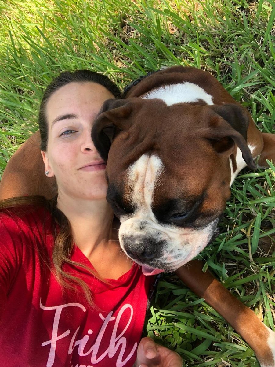 Kendra and her furry kids at The Caring Paws