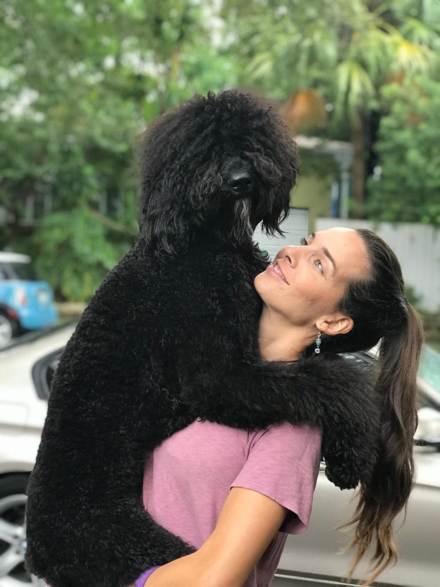 Kendra and her furry kids at The Caring Paws